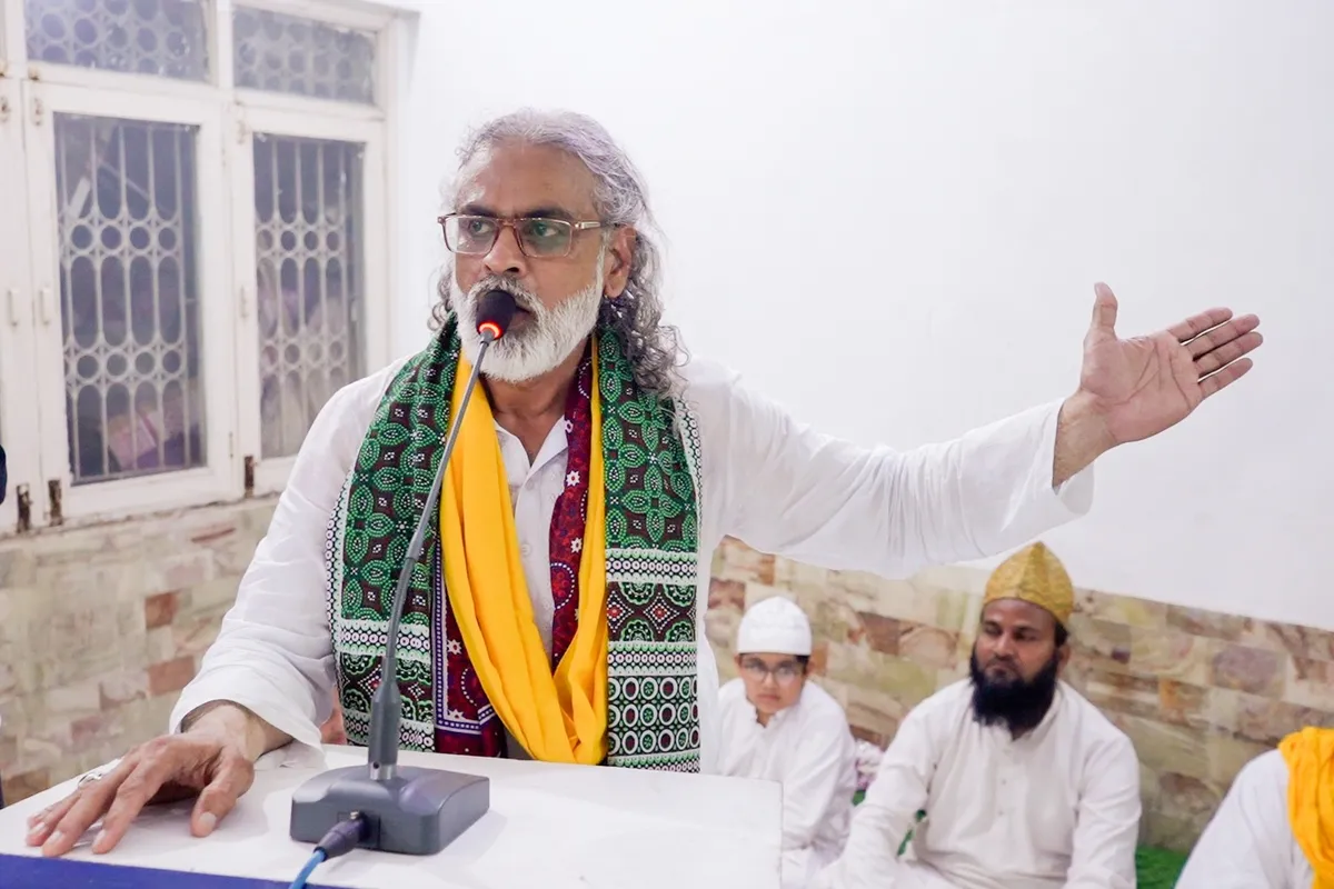 Chairman speaking with expressive gesture